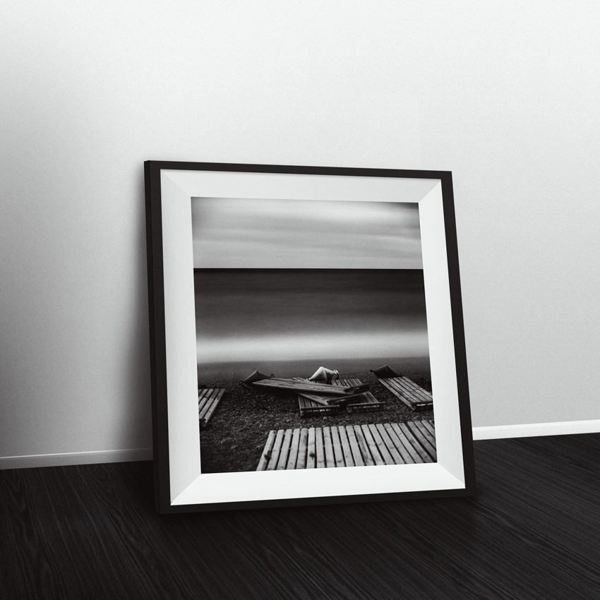 Buy framed archival black and white landscape photographic print «Three Buoys» near the wall in room interior as decoration or art collection